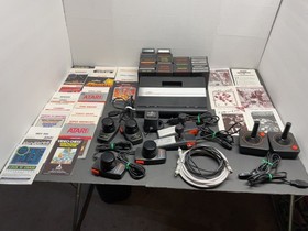 ATARI  7800 Pro System Console  34 Games and  Manuals   Tested   Working
