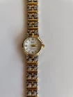 Vintage Women’s Seiko Working New Battery 18K Gold Plated white, and gold face