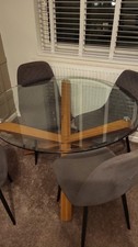 Glass Topped Dining Table And Four Chairs