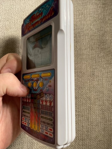 Tiger Electronics Slot Machine Handheld Game Blue Diamonds LCD 1995 Vtg Tested - Picture 6 of 11