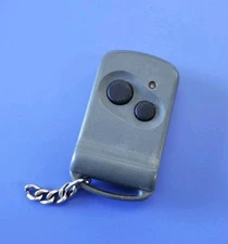 UNBRANDED 2 BUTTON REMOTE TRANSMITTER - H83LEC8T - GRAY CASE