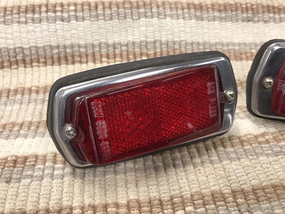 Par de luces marcadoras laterales traseras rojas Datsun OEM 240Z 260Z 280Z 1970-78 Foto 2 de 4