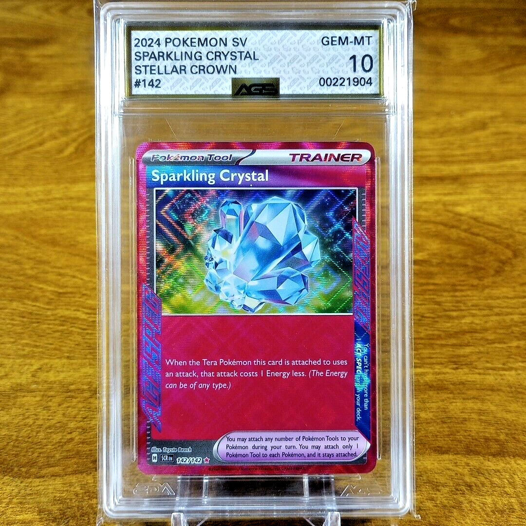 Pokemon Stellar Crown Trainer Tool Sparkling Crystal 142/142 AGS