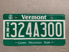ONE EXPIRED VERMONT LICENSE PLATE  RANDOM LETTERS/ NUMBERS FAIR CONDITION TRUCK