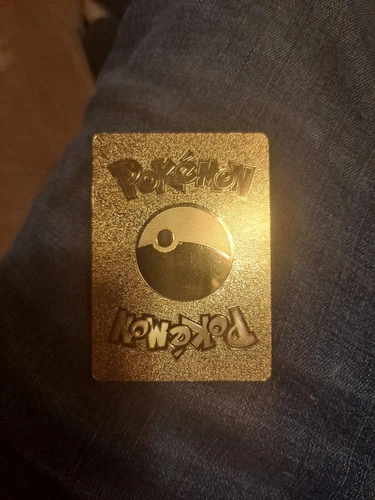 pokemon 1st edition shining charizard gold card.107/105.