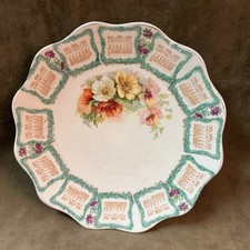 Vintage 1909 calendar plate from Houston Texas floral design with worn marking