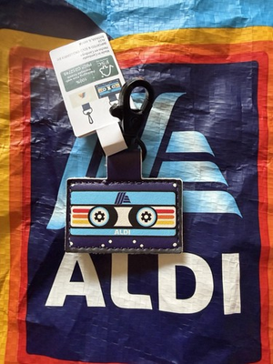 #ad Aldi Gear Keychain Quarter Holder 50th Anniversary Cassette Tape 2026 NWT $5.99