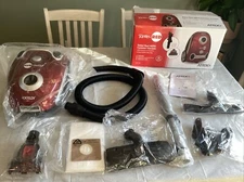 Corded HEPA Filter Rebel Red Bagged Multi-Surface Red Canister Vacuum Cleaner