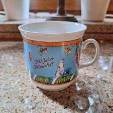 Gerd Käfer Sammlertasse mit Motiv "200 Jahre Oktoberfest", 350 ml