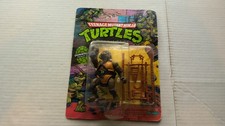 Vintage TMNT MOC Donatello 10 Back Action Figure 1988 Playmates Mirage Unpunched