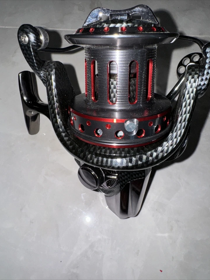 Carrete de pesca Sougayilang AFL 1000 lg peso aluminio ultra suave giratorio F... Foto 3 de 4