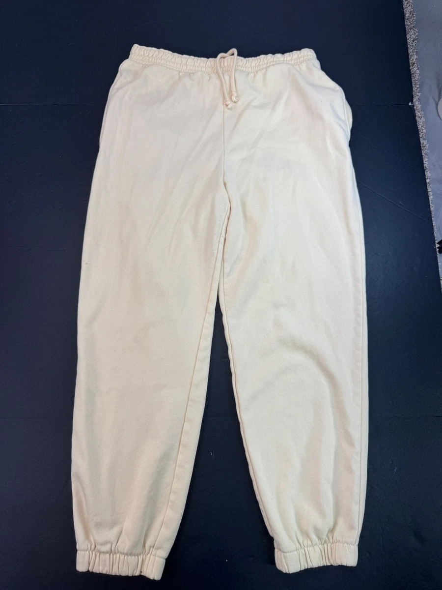 Pantalones deportivos medianos H&M para mujer amarillo claro con cordón elástico