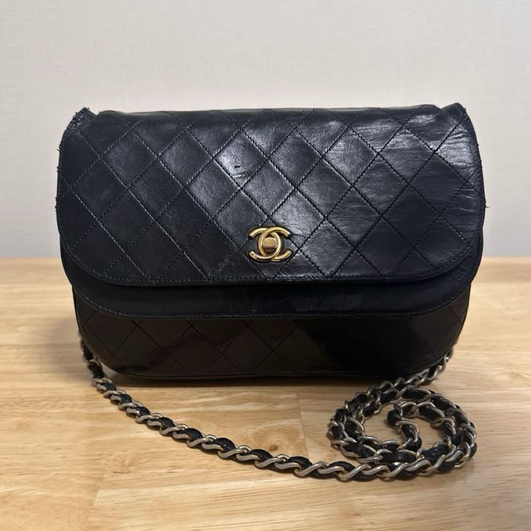 CHANEL Matelasse Double Flap Turnlock Shoulder Bag in Black Caviar Leather