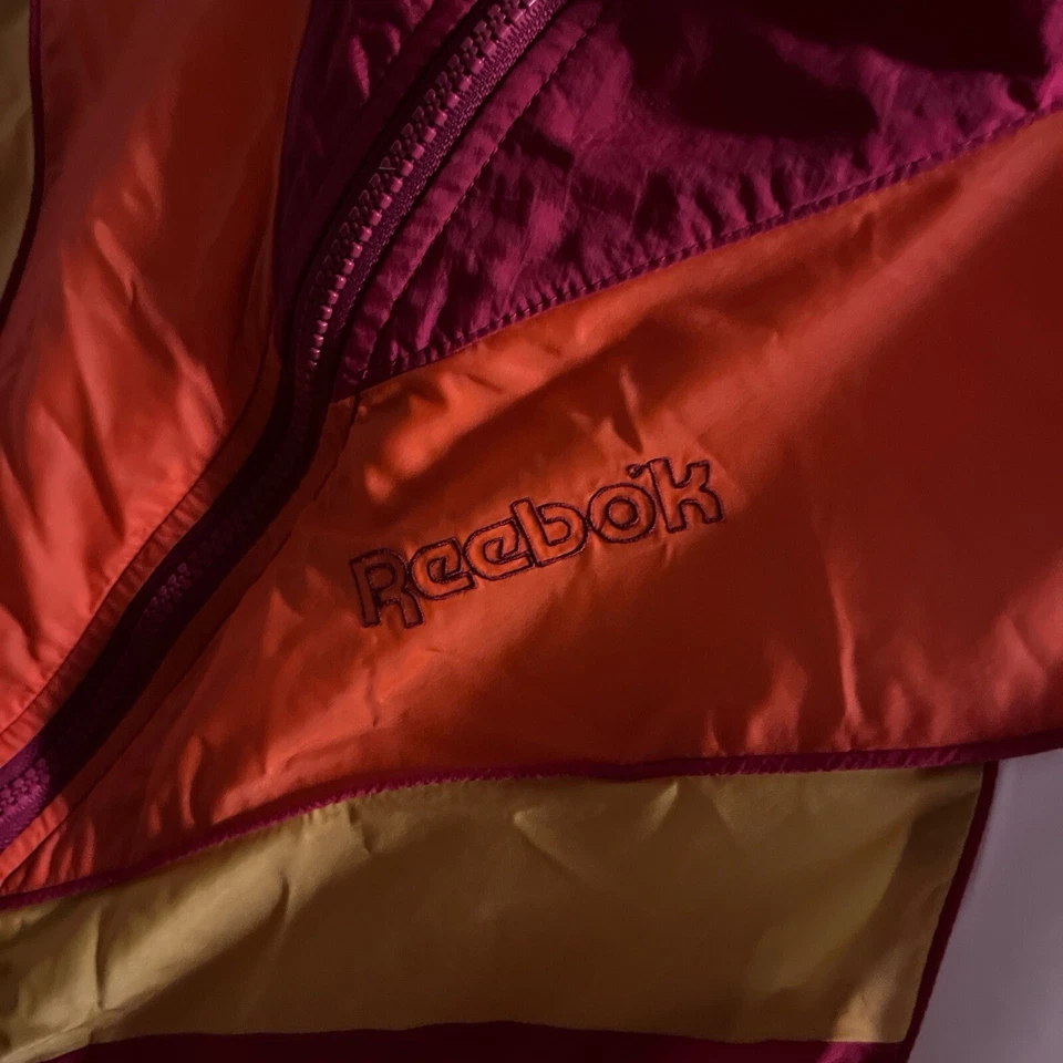 Cortavientos Reebok vintage, rojo naranja y blanco de los años 90 Foto 3 de 4