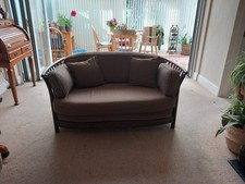 Ercol cottage style 2 seater settee in good used condition, in brown pattern.