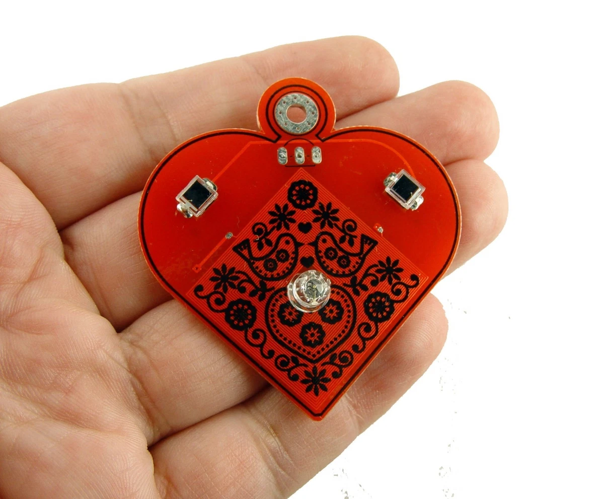 Blinking heart necklace sale
