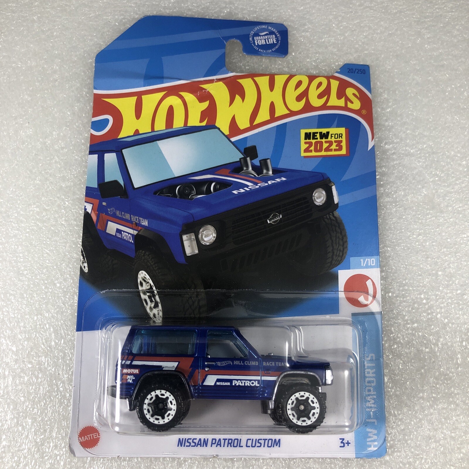 Nissan Patrol Custom HW J Imports 1/10 Blue Red White 2023 Long Card