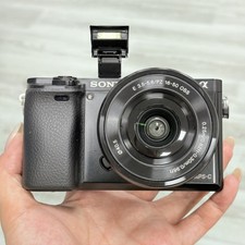 Black Sony Alpha A6000 Mirrorless Digital Camera w/16-50mm Lens with Charger