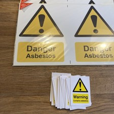 4 znaki niebezpieczne azbest 150x200mm +21 ostrzegawcze zawierają znaki azbestowe 50x 70mm
