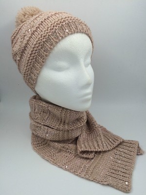 pink bobble hat and scarf