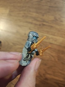 LEGO Ninjago Minifigure Silver Zane Titanium 2 Gold Sai Weapons 70748 As Is