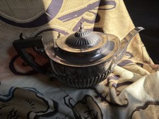 matching silverplated teapot that completes your threepiece tea set