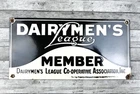 VINTAGE 10x5" DAIRYMEN'S LEAGUE MEMBER DAIRY PUMP PORCELAIN GASOLINE OIL SIGN