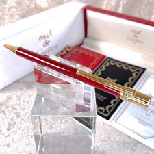 Penna a sfera Cartier vintage lacca bordeaux finitura oro con custodia e documenti