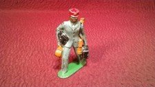 Lot 10 - MANOIL BARCLAY FIGURE - TRAIN PORTER - BLACK SKIN - RED CAP