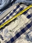  Farmhouse-style egg apron features a blue and white checkered pattern — photo 4