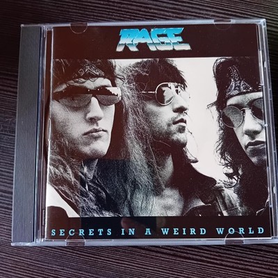 RAGE - CD  - Secrets in a Weird World - Heavy Metal - Sehr Gut