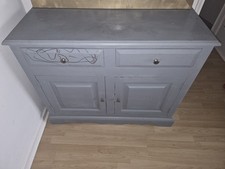 A Storage Cabinet And Corner Display Cabinet