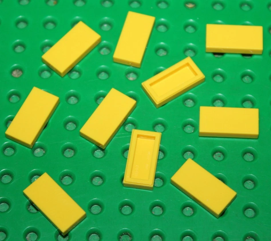 10 x Lego Yellow Tile 1x2 ref 3069b sets 8037 951 856 10182 21307 5767 268 5571 - Photo 1/1