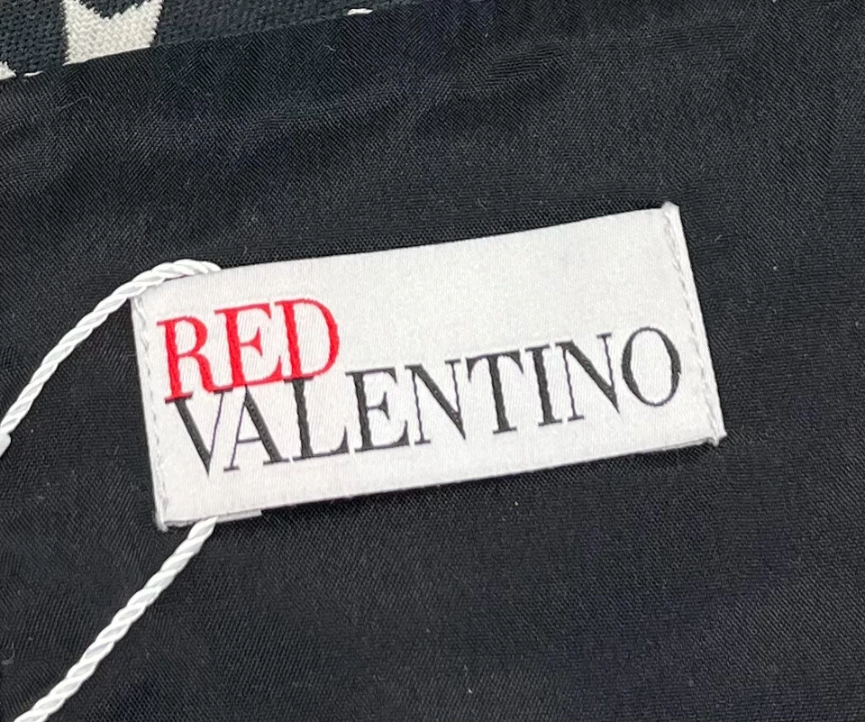 Mini falda acampanada roja Valentino negra con estampado de estrellas talla 42 Foto 4 de 4