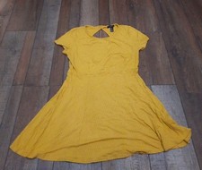 Forever 21 dress Mustard Yellow Color, Large. Teardrop Open Back