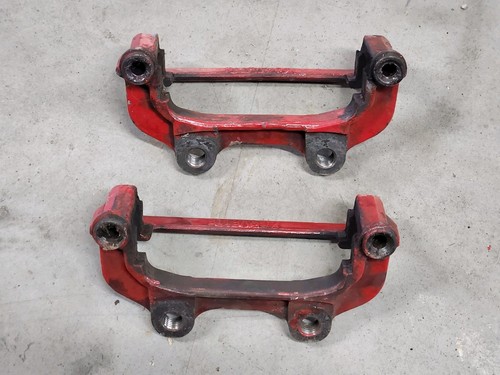 86 Corvette FRONT BRAKE CALIPER MOUNTING BRACKETS Carrier 85 87 GM OEM - Picture 2 of 3