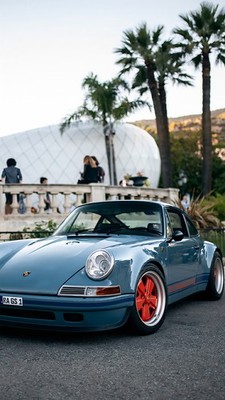 Classic Porsche 911 Sports Car with Red Wheels Vintage Style Photo Reprint