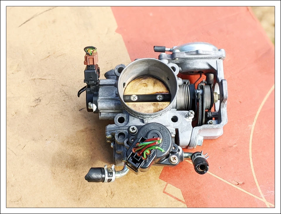 ✅ Cuerpo de acelerador GENUINO para 1998-2003 MITSUBISHI Montero Sport 3,0 L V6 OEM Foto 4 de 4