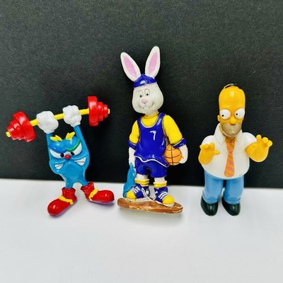 Lot of 3 - Toy Figures Izzy Olympic Mascot, Homer Simpson, Basketball Bunny 3 