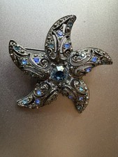 Rhinestone Black Starfish Brooch 2 Inches Blue And Clear Rhinestones
