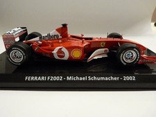 Modèle réduit FERRARI F1 2002  AU  1/24 avec stickers  de marque ALTAYA