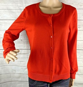 bright orange cardigan