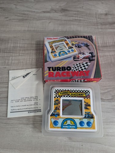 Retro Tandy Turbo Raceway gioco arcade portatile in scatola originale testato funzionante - Foto 4 di 12