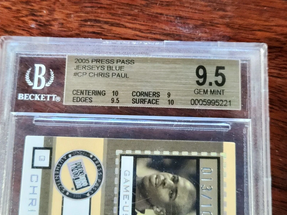 Tarjeta de novato Chris Paul 2005 Press Pass Jersey dorado #JC/CP 013/100 Beckett 9,5 Foto 2 de 2