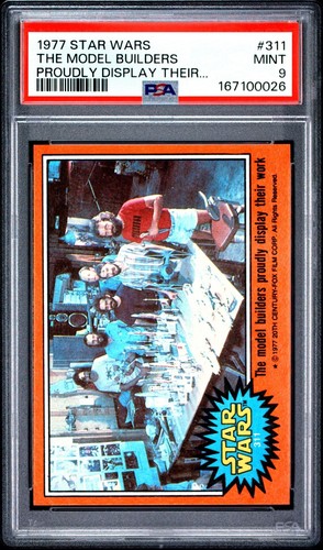 1977 Topps Star Wars #311 The model builders proudly display their work — PSA 9