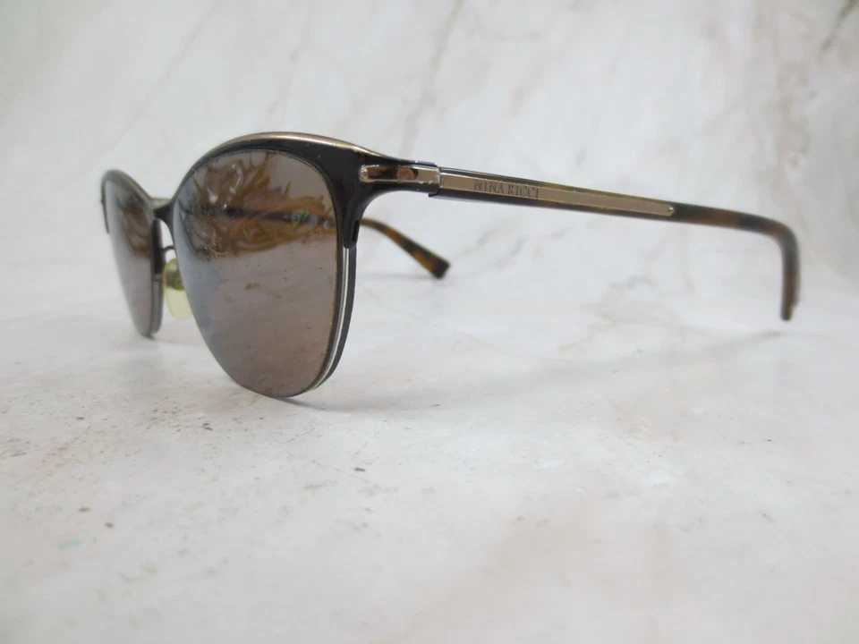 Gafas de sol Nina Ricci marco VNR100K COL.0162 para mujer marrón metal medio borde 52-135 Foto 2 de 4