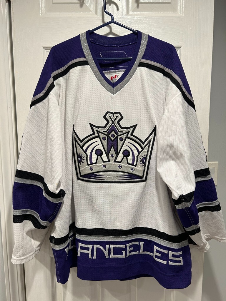 Authentic LA Kings GAME WORN #25 Belanger size 54 CCM White Purple