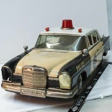 Nomura Mercedes Benz 220S Police Car Wheel missing Tin Toy Malfunction