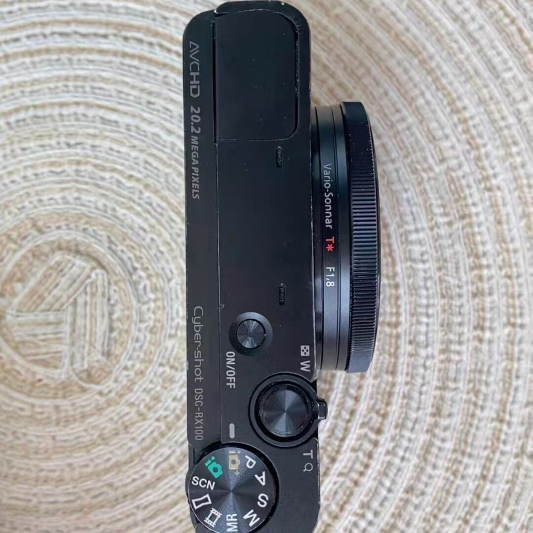 Sony Cyber-Shot DSC-RX100 20.2MP 35 Language Compact Digital