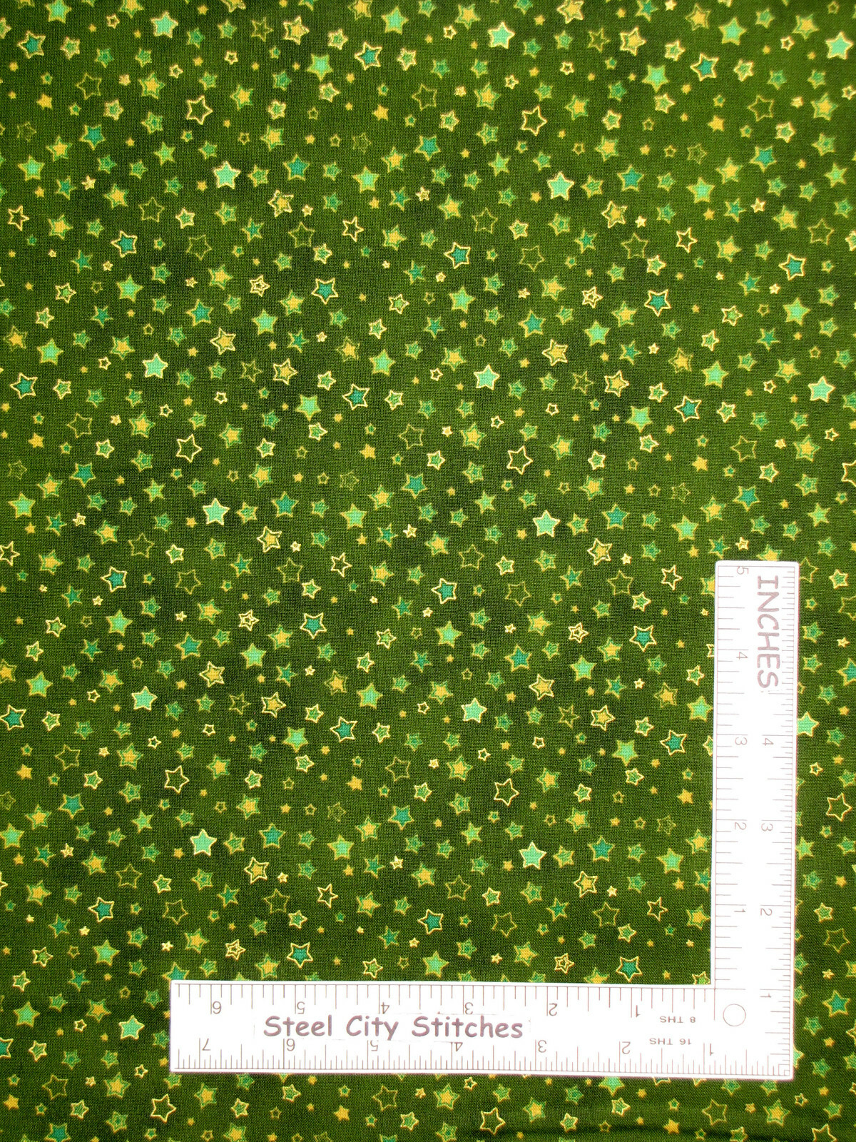 Christmas Stars Star Toss With Gold On Green Cotton Fabric Oasis By The Yard